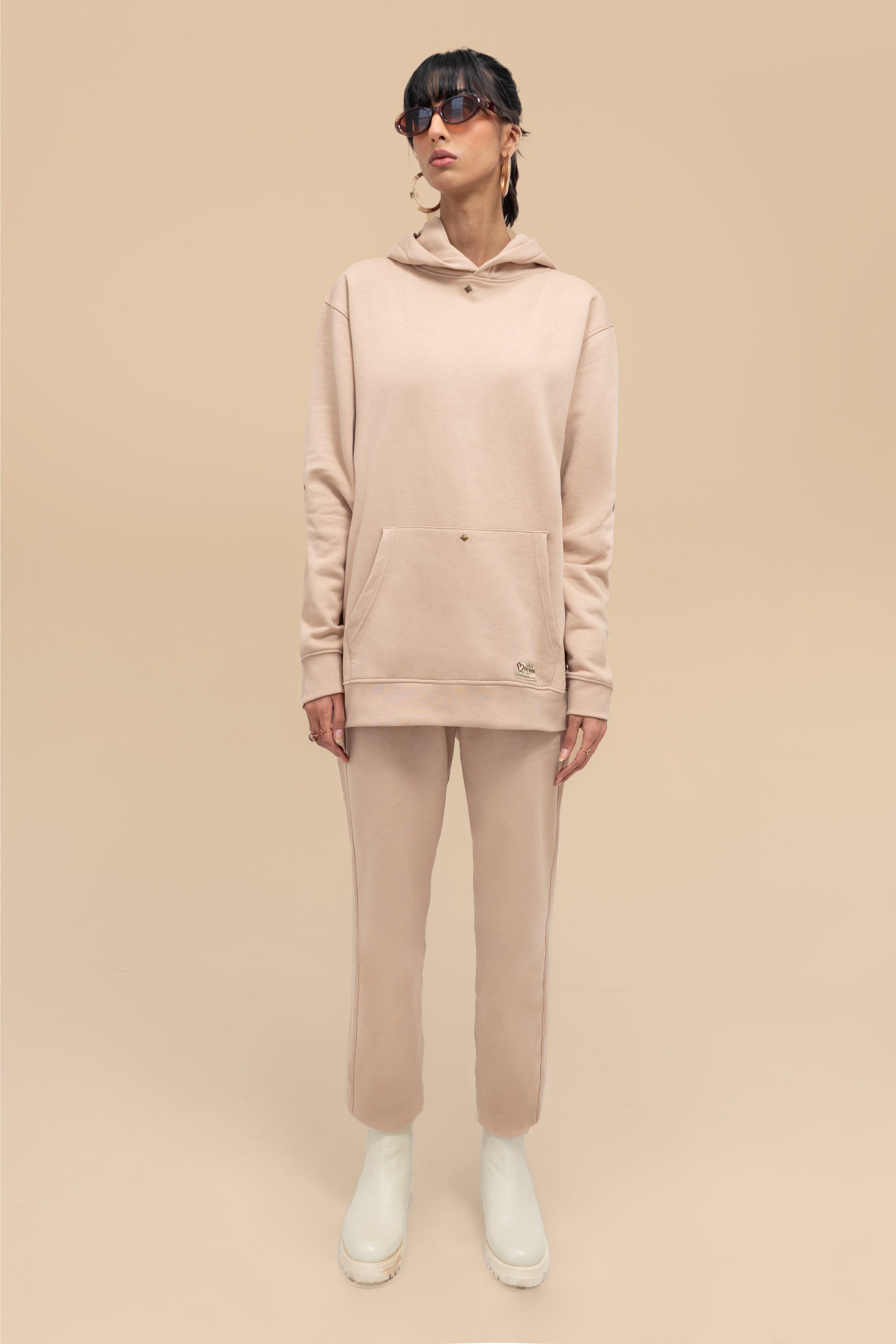 front view of the Neutral Nude Uni Hoodie Set, highlighting the casual yet stylish design of the hoodie and jogger pants.