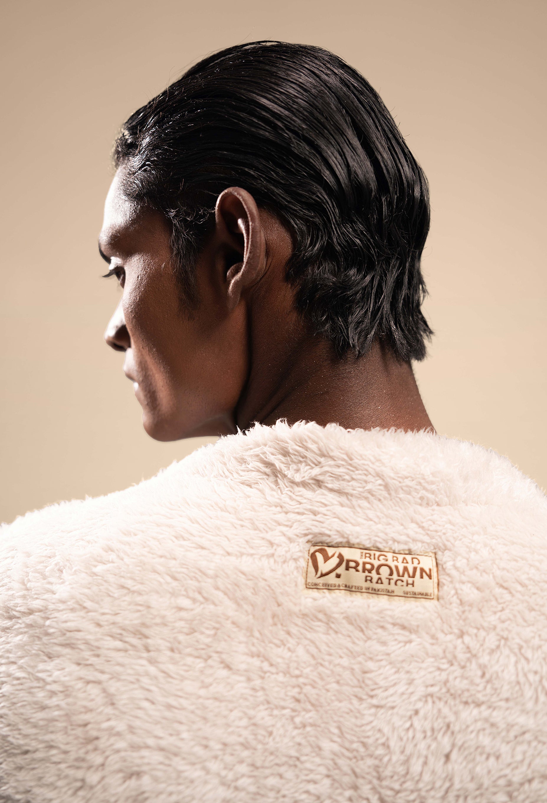 Close-up view of the Plush Comfort Long Sherpa Fur Uni Vest, showcasing the soft, fluffy texture of the sherpa fur and detailed stitching.