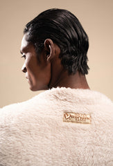 Close-up view of the Plush Comfort Long Sherpa Fur Uni Vest, showcasing the soft, fluffy texture of the sherpa fur and detailed stitching.