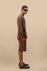 Side view of the Toffee Brown Uni thermal short set, highlighting the sleek cut of the thermal top and matching shorts for a flattering silhouette.