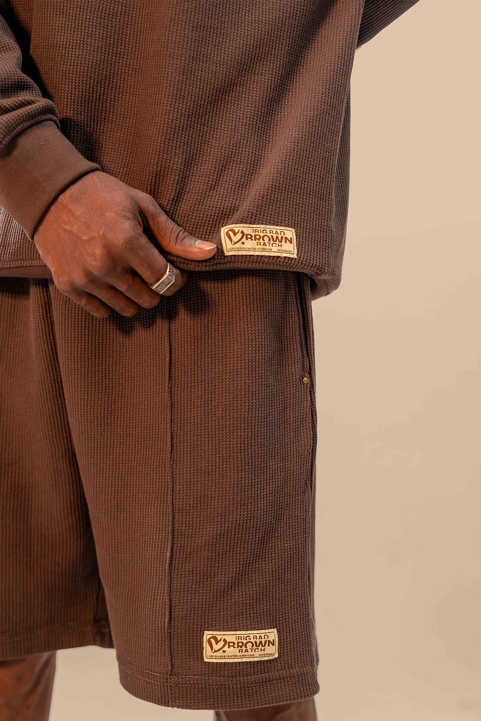 Close-up view of the toffee brown thermal top from the set, showcasing the soft fabric and comfortable, cozy fit.