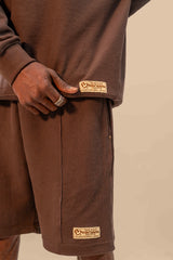 Close-up view of the toffee brown thermal top from the set, showcasing the soft fabric and comfortable, cozy fit.