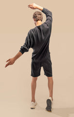 Back view of the Urban Black Uni thermal short set, showing the simple yet stylish design of the thermal top and shorts.