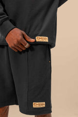 Close-up of the black thermal top from the Urban Black Uni thermal short set, showcasing the texture and comfortable fit of the fabric.